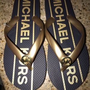 Michael Kors flip-flops size 6 navy blue never worn